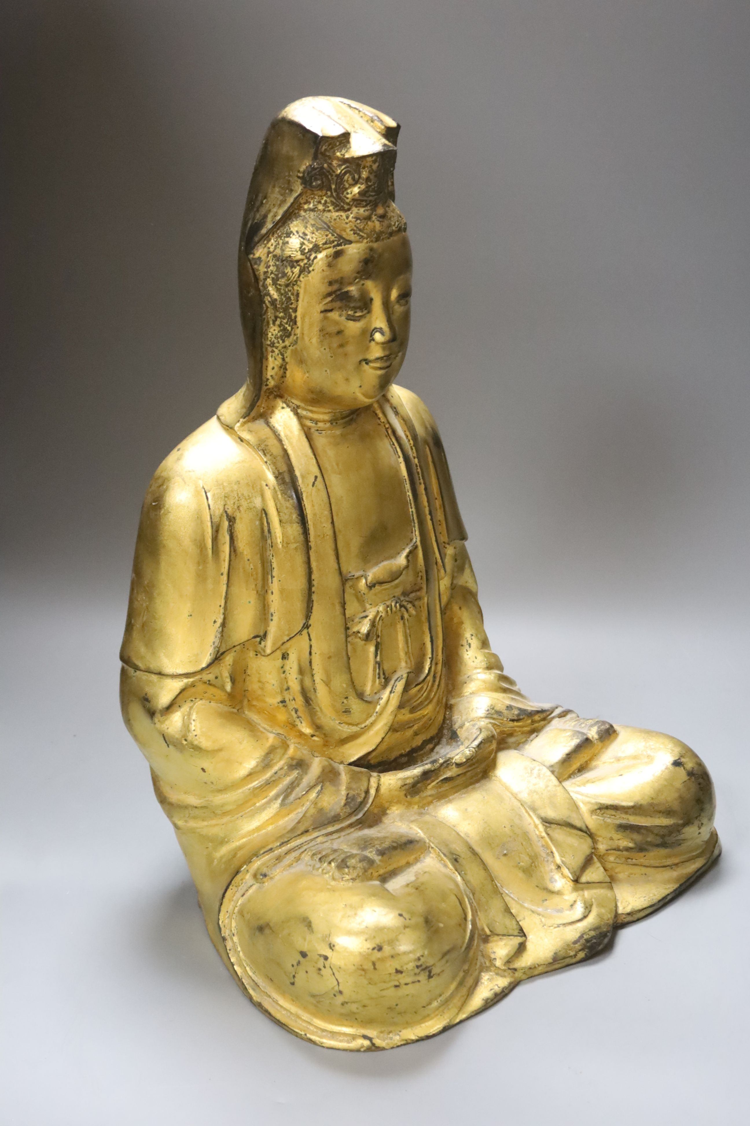 A large gilt bronze figure of Guanyin, height 44cm